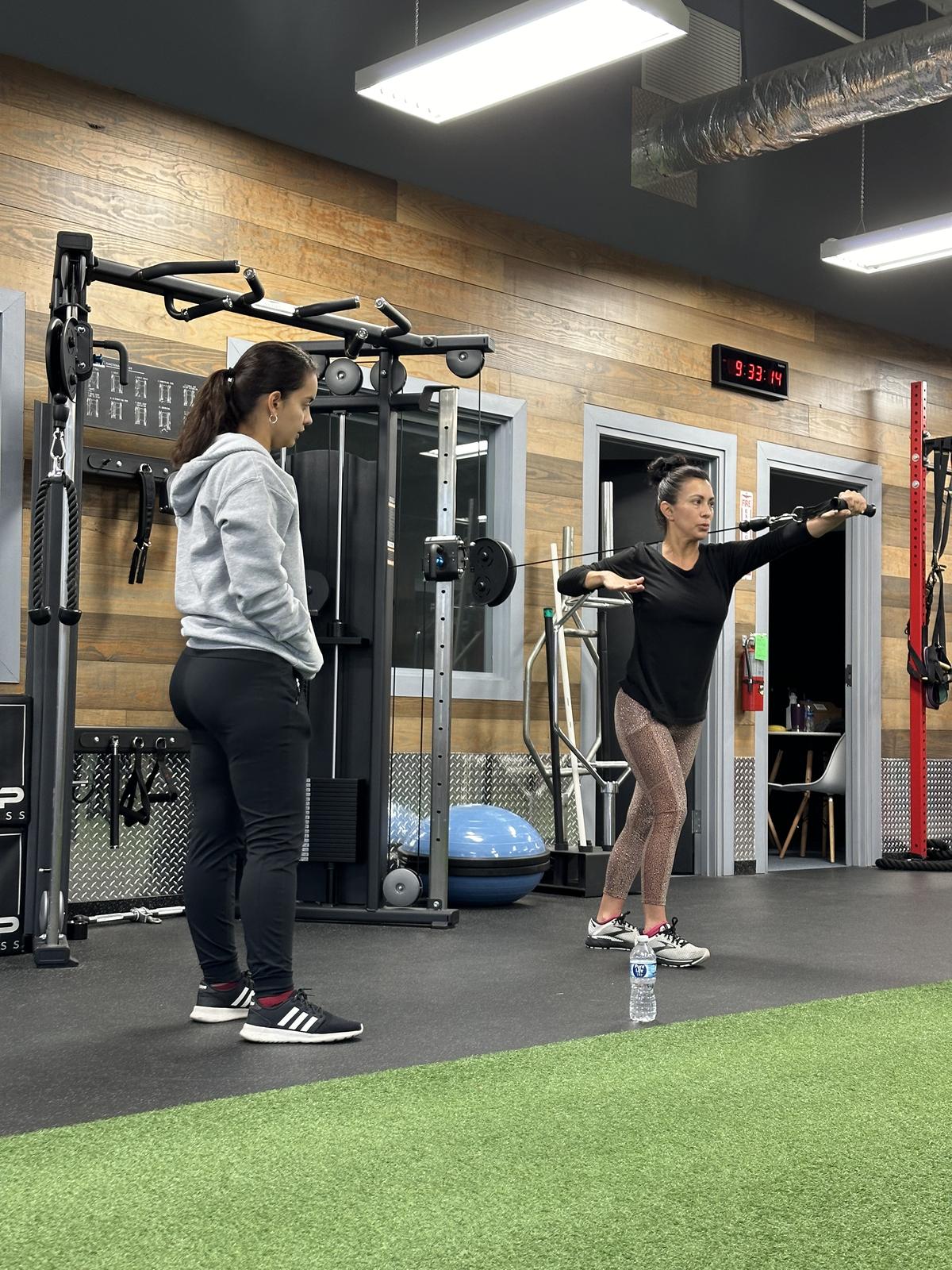 One on one personal training session in progress at Core Progression North Austin